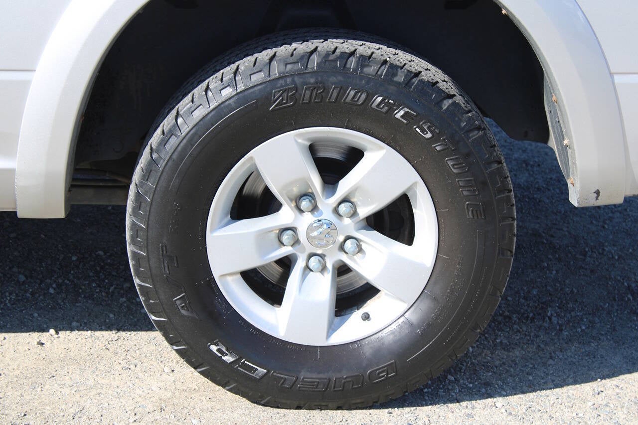 2014 RAM 1500 SLT 4x4 4dr Quad Cab 6.3 ft. SB Pickup