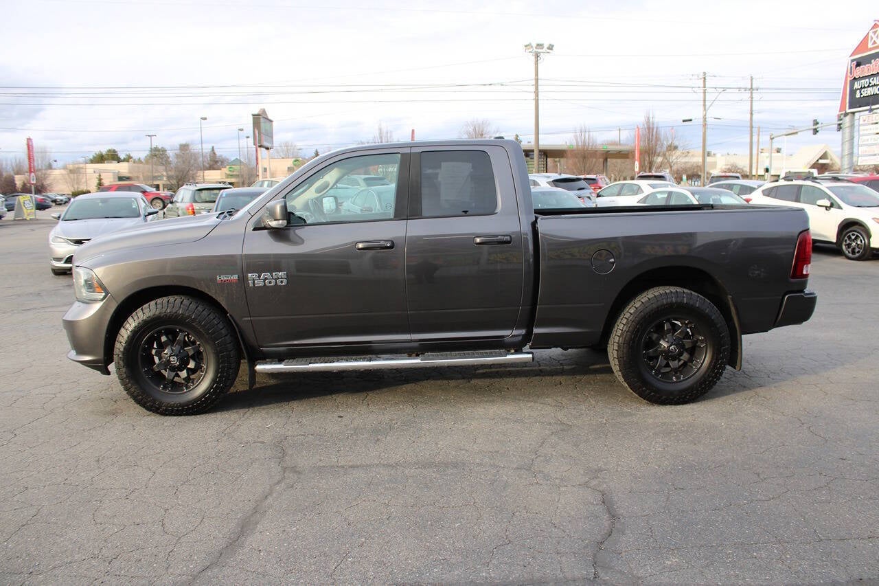 2015 RAM 1500 Sport 4x4 4dr Quad Cab 6.3 ft. SB Pickup
