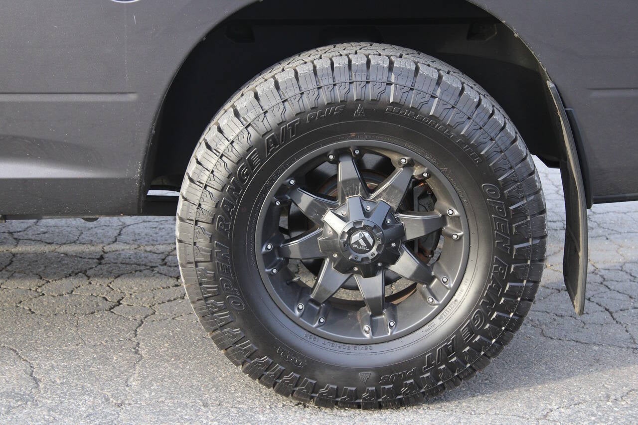 2015 RAM 1500 Sport 4x4 4dr Quad Cab 6.3 ft. SB Pickup