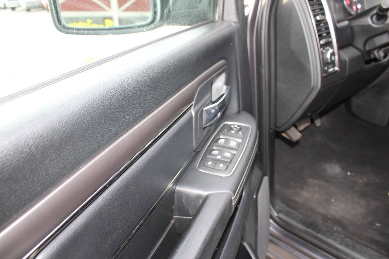 2015 RAM 1500 Sport 4x4 4dr Quad Cab 6.3 ft. SB Pickup