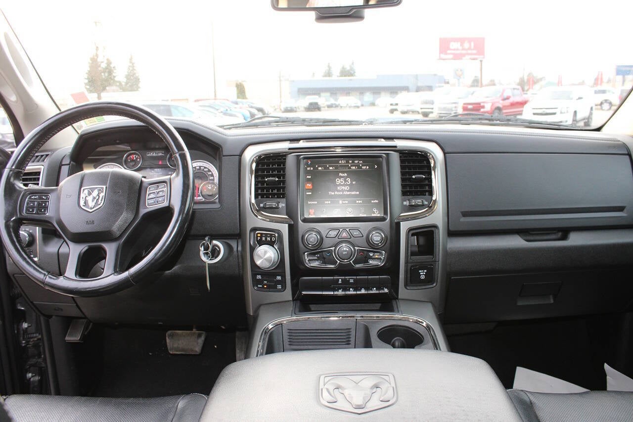 2015 RAM 1500 Sport 4x4 4dr Quad Cab 6.3 ft. SB Pickup