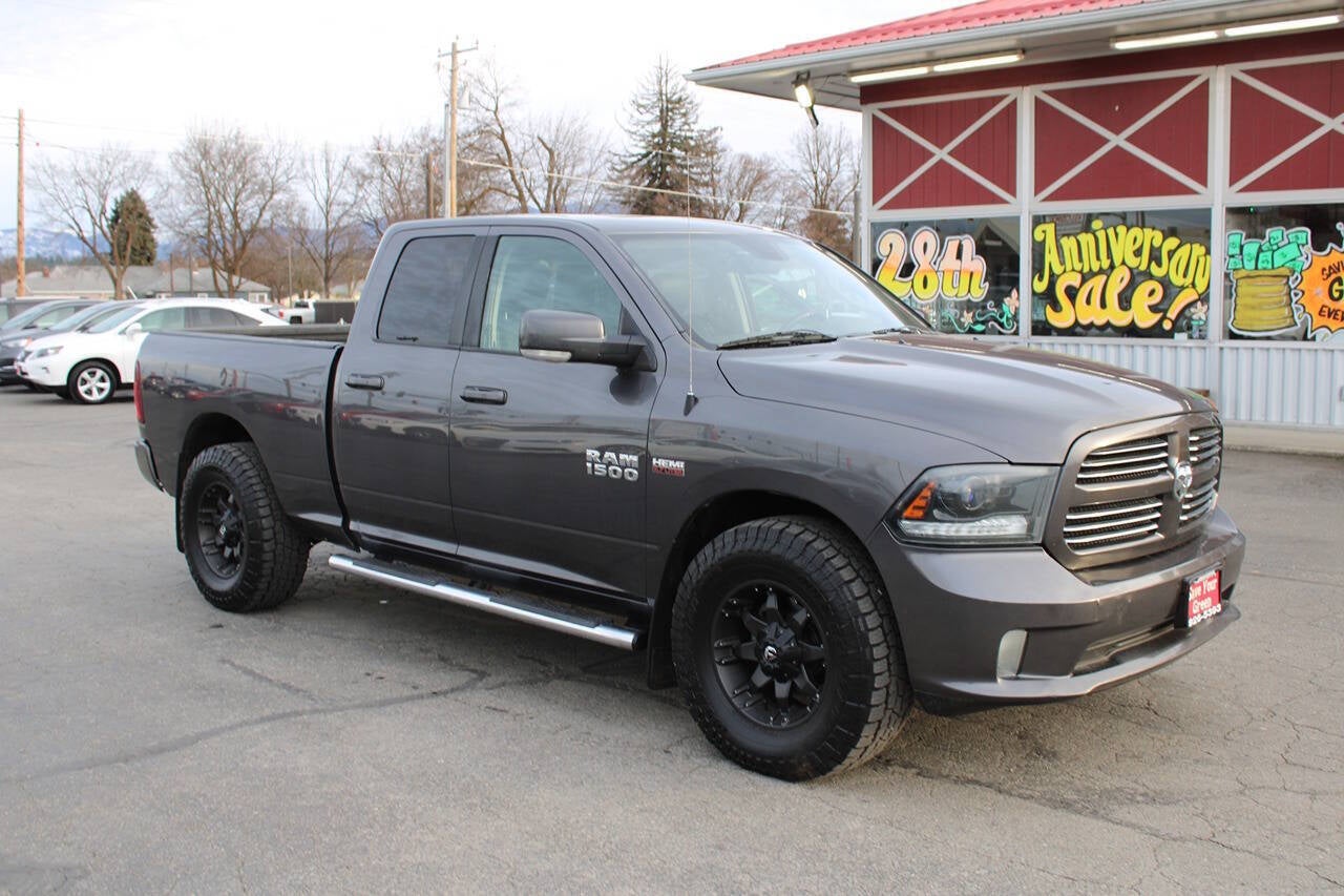 2015 RAM 1500 Sport 4x4 4dr Quad Cab 6.3 ft. SB Pickup