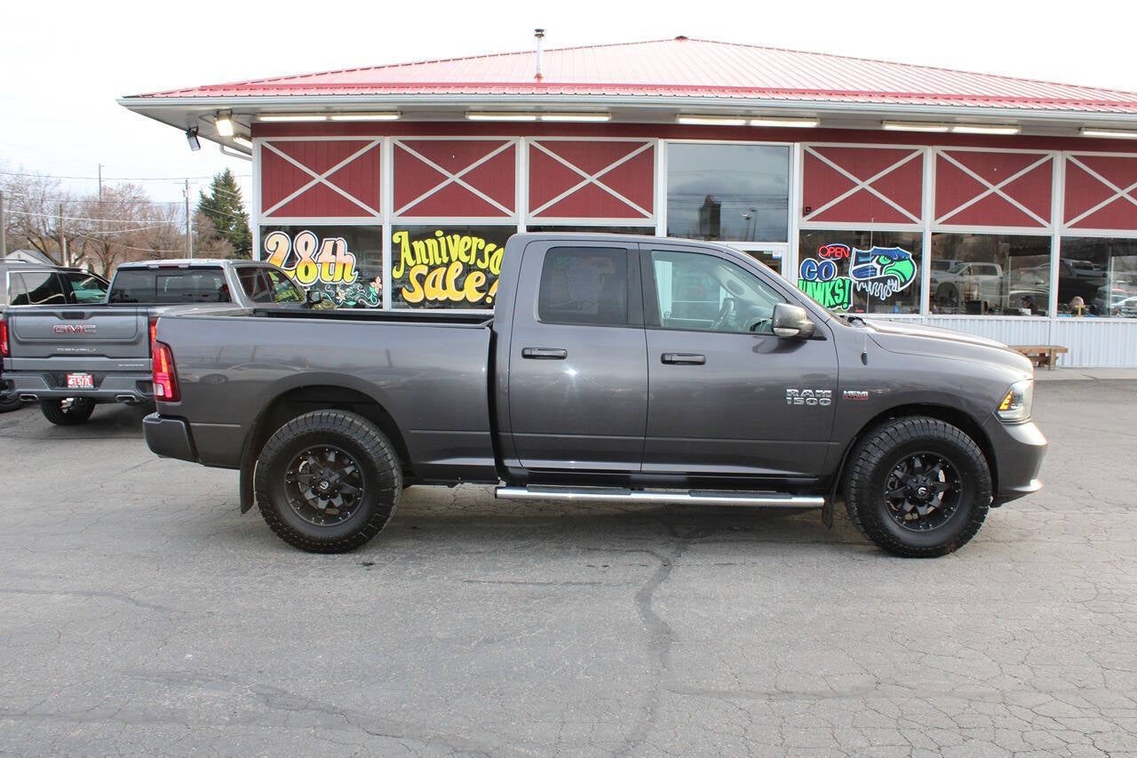 2015 RAM 1500 Sport 4x4 4dr Quad Cab 6.3 ft. SB Pickup