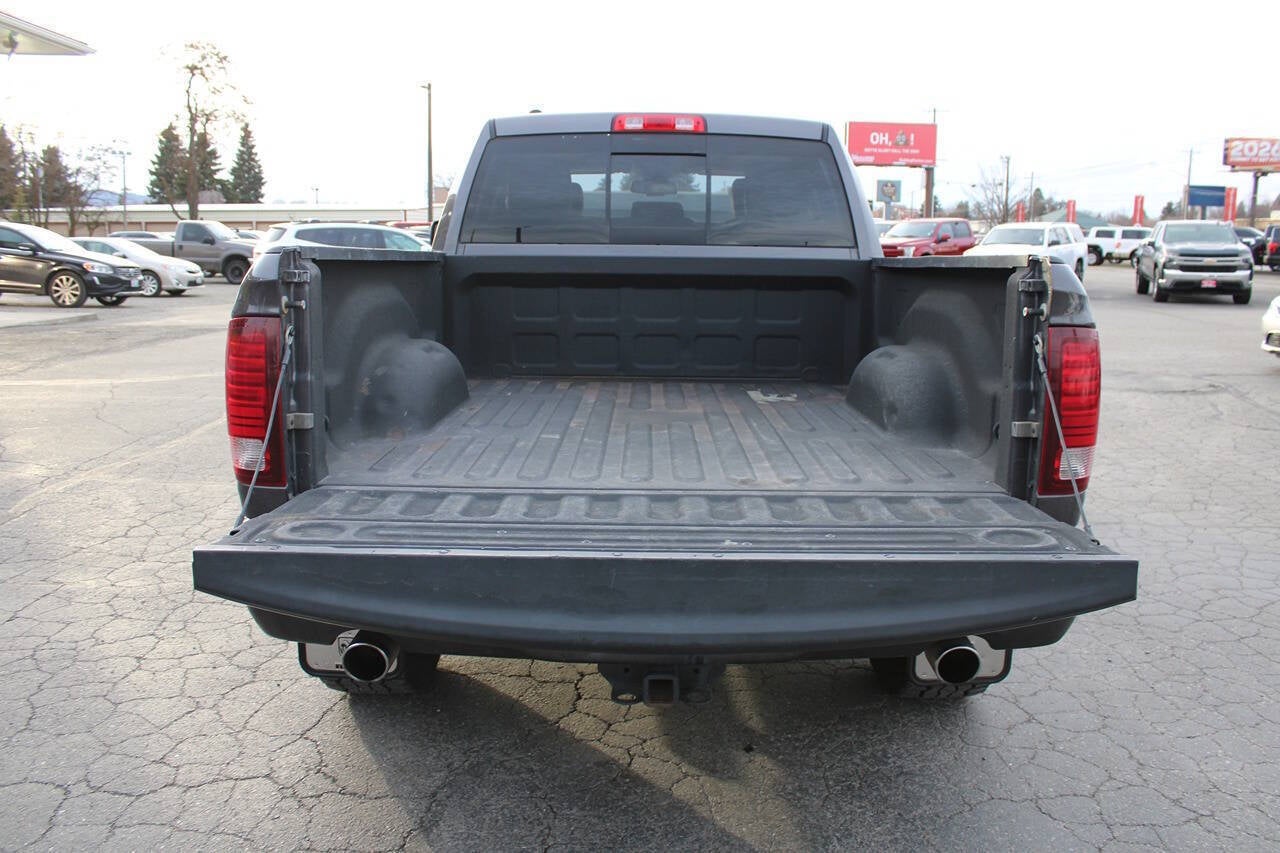 2015 RAM 1500 Sport 4x4 4dr Quad Cab 6.3 ft. SB Pickup