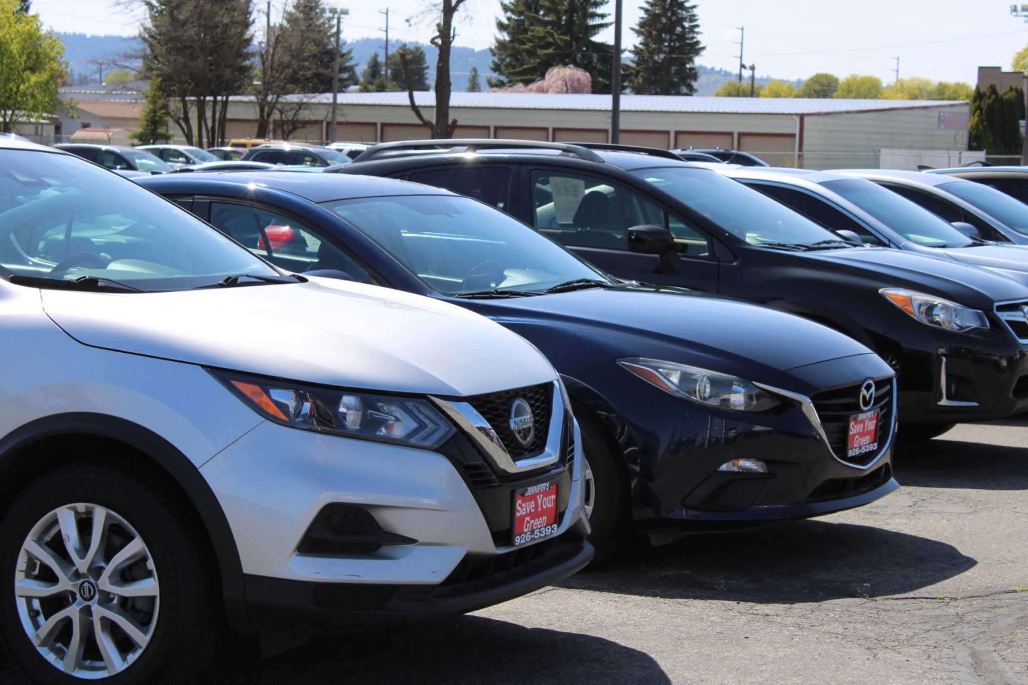 Row of used cars and SUVs for sale at a Spokane Valley used car dealership lot